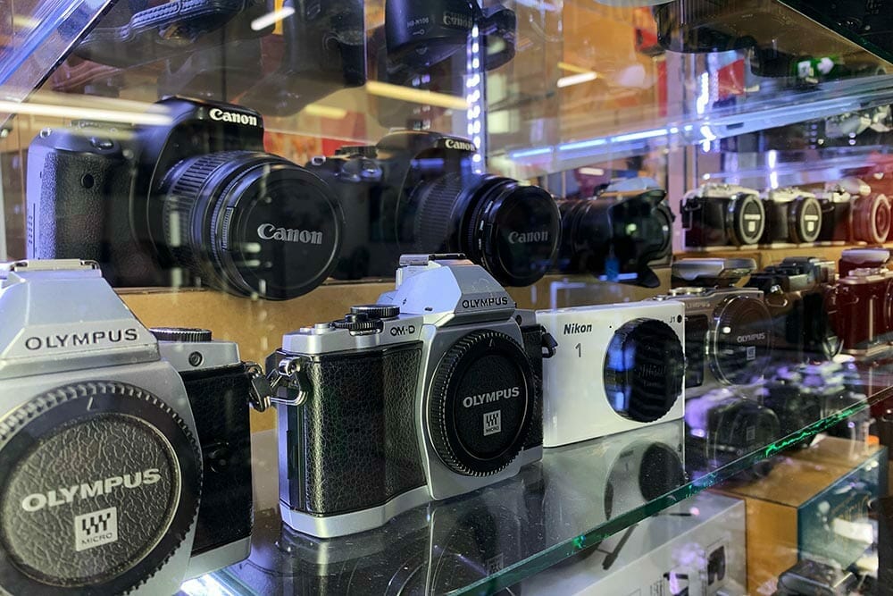 Bangkok, Thailand : December-4-2020 : second hand camera display on shop window in camera store